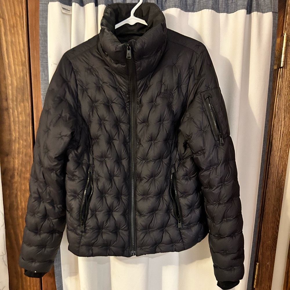 North face puffer jacket with side arm pocket